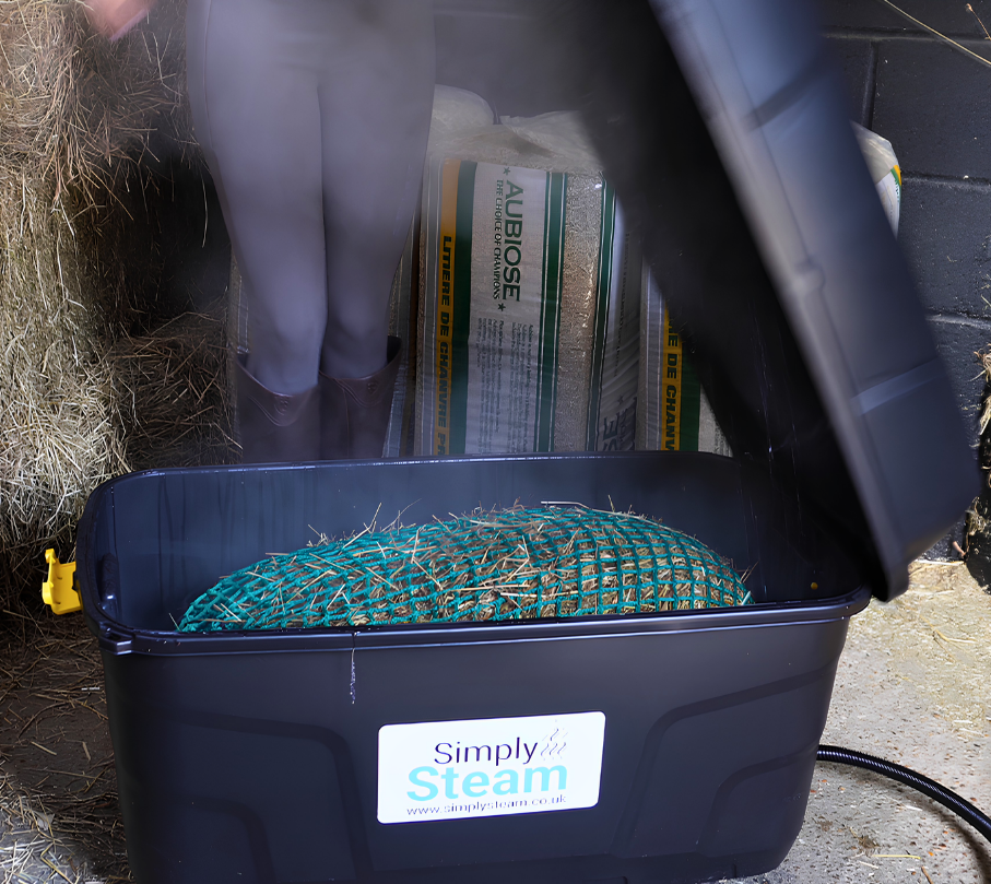 Steam rising as the Simply Steam hay steamer is opened